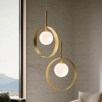 Distinguished Stillux Balloons suspension lamp with a matte white glass sphere encased within a glossy gold metal ring