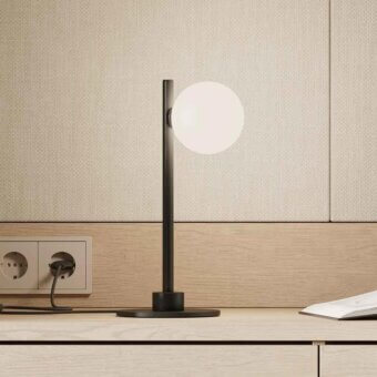 Exceptional Stillux Balloons table lamp with matt white glass sphere and dark metal stem crafted in Italy