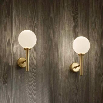 Exceptional Stillux Balloons wall lamp crafted in Italy with round matt white glass and slender golden metal frame