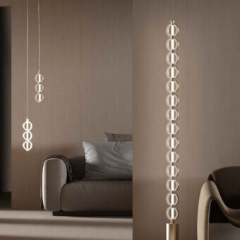 Elegant Stillux Chain floor lamp with interconnected metal rings and frosted pyrex glass built in light gold tone with satin finish