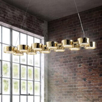 Elegant Stillux Circle suspension lamp with matt white glass diffusers encircled by a hammered metal frame and glossy gold finish