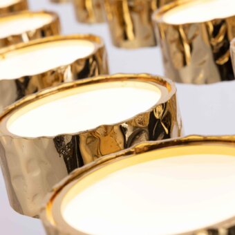 Captivating Stillux Circle suspension lamp with hammered golden metal frame and bright white illumination within a cylindrical shade