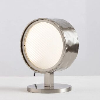 Distinguished Stillux Circle table lamp with a luminous white diffuser and hammered metal frame in satin silver finish
