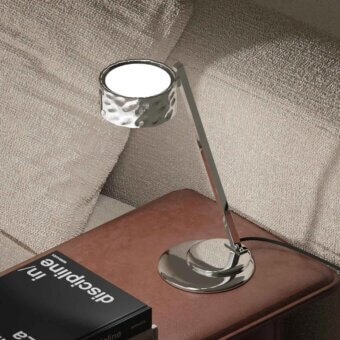 Superior Stillux Circle table lamp with matt white glass diffuser, hammered metal frame and glossy silver finish