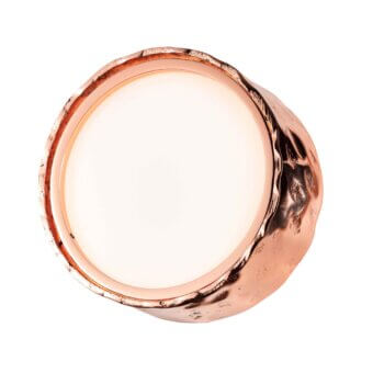 Superior Stillux Circle wall lamp crafted in copper-toned hammered metal with smooth white glass diffuser and textured finish