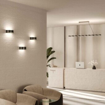 Elegant Stillux Circle wall lamp with semicircular matt white glass diffuser and refined hammered metal frame