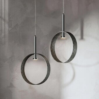 Distinguished Stillux Eclipse suspension lamp with a hammered metal ring and dark grey finish offering suggestive light diffusion