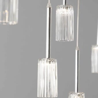 Distinguished Stillux Flow suspension lamp with clear vertically-ridged glass pendants and silver-toned metal rods creating a minimalist aesthetic