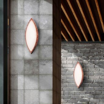 Distinguished Stillux Leaves wall lamp crafted in copper tone hammered metal with a satin finish glass diffuser