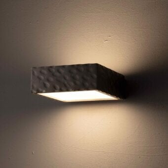 Elegant Stillux Square wall lamp with a textured dark gray hammered metal frame and square white glass diffuser