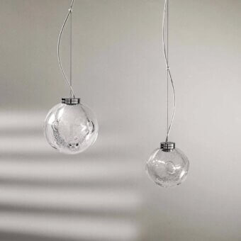 Exceptional Stillux The Light suspension lamp with a transparent Certified Lead Crystal diffuser and sleek chrome metal frame