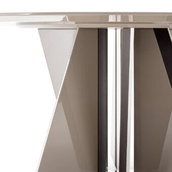 Exceptional Turri Milano table with a glossy lacquered geometric base, reflective glass top and taupe leather accents
