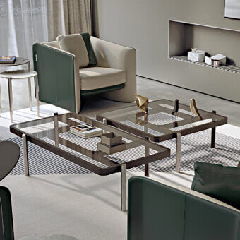 Sophisticated Turri Vision coffee table with transparent glass and dark-stained wood, built with sleek metal legs and marble applications
