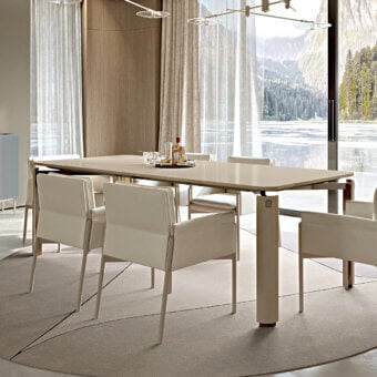 Distinguished Turri Zenit table with glossy lacquered wood and cylindrical legs crafted in glossy lacquered metal