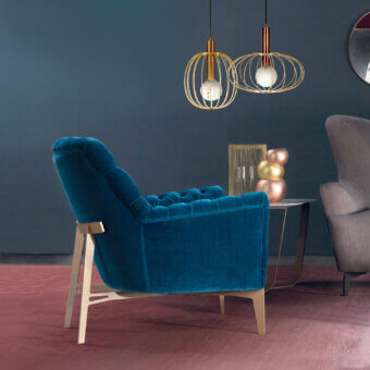 Lavish Borzalino Eve Capitonnè lounge chair with deep teal fabric and lacquered oak base exhibiting button-tufting