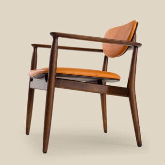 Distinguished Borzalino Regina lounge chair with tan leather upholstery and dark brown solid wood construction