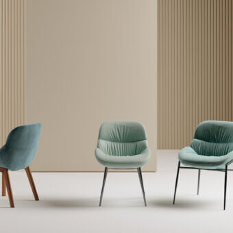 Sophisticated Bontempi Amelie chair with curved upholstered seat and thin black metal legs