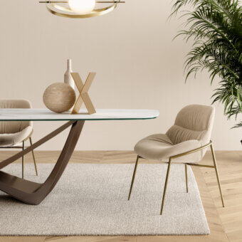 Superior Bontempi Amelie chair with gently curved upholstered form and gold-toned metal legs in beige textile