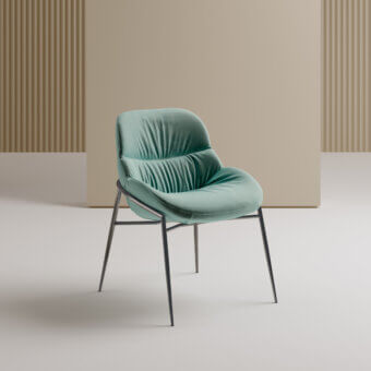Elegant Bontempi Amelie chair with rounded silhouette upholstered in light greenish-blue textile and dark metal frame