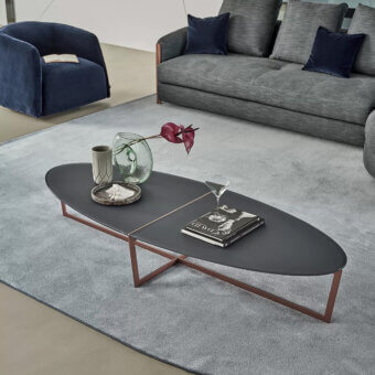 Distinguished Bontempi Cross coffee table with dark gray and copper tabletop supported by a sleek copper-toned metal frame and matte finish