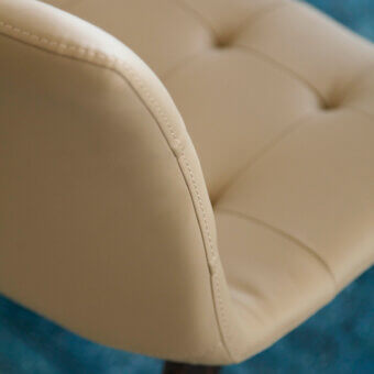 Superior Bontempi Kuga Wood chair upholstered in smooth light beige synthetic material with subtle tufted detailing