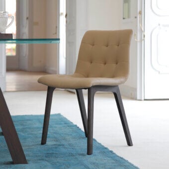 Elegant Bontempi Kuga Wood chair with light tan textile upholstery and dark-toned matte wood frame