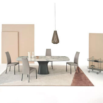 Superior Bontempi Podium Barrel table with austere lines, a dark grey concrete base and white tabletop with subtle grey veining