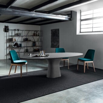 Sophisticated Bontempi Podium table with austere lines and a matte dark gray concrete base and tabletop