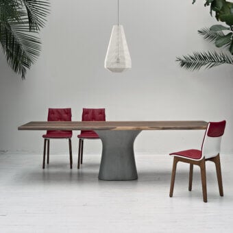 Distinguished Bontempi Podium table with austere lines and a matte wood tabletop built upon a smooth gray concrete base
