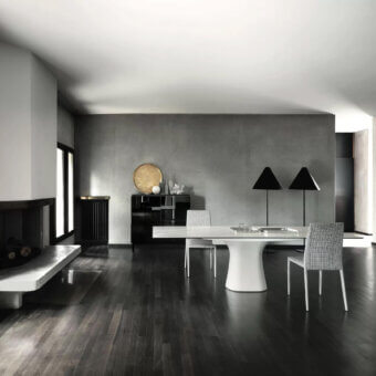 Exceptional Bontempi Podium table with sinuous lines and a glossy white marble tabletop built upon a solid white concrete base