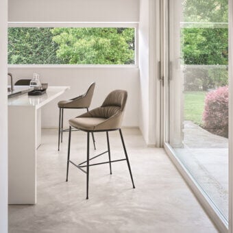 Superior Bontempi Queen stool with taupe textile and pleated back built with slender black metal legs