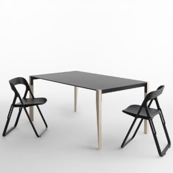 Distinctive Casamania Bek chair crafted in matte black synthetic material with a triangular opening backrest and fiberglass reinforced construction