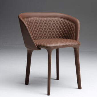Exceptional Casamania Lepel armchair fully upholstered in premium brown leather with lighter brown diamond stitching and unified finish