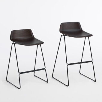 Exceptional Casamania Pressious stool with bent plywood beech seat and black metal sleigh base crafted in Italy