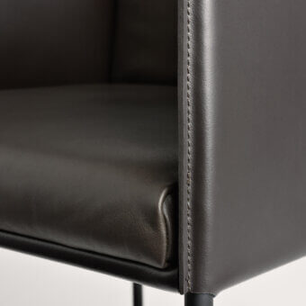 Superior Frag Square stool with smooth dark gray leather and slender metal frame construction