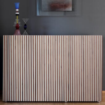 Exceptional Horm Leon sideboard with standpoint-dependent visualization in light beige and medium brown hues built with premium wood and cylindrical metal legs
