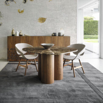 Distinguished Horm Marina table crafted with cylindrical walnut legs and a marbled brown premium marble top with a smooth matte finish