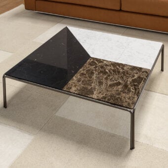 Lavish Horm Ragtime coffee table crafted in Carrara, Emperador, and Marquina marble with a bronze painted metal frame