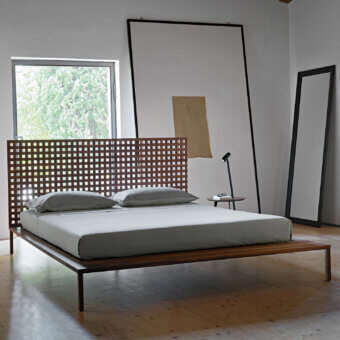 Distinguished Horm Twine bed crafted in solid wood with a warm brown tone and matte finish, showcasing an orthogonal slat headboard