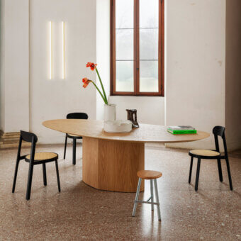 Elegant Miniforms Monoplauto table with a perforated light brown wooden top and polygonal base crafted in Italy