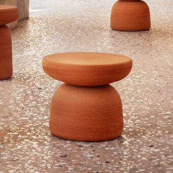 Captivating Miniforms Tototò coffee table crafted from 100% terracotta with a matte reddish-brown finish presenting a modern silhouette