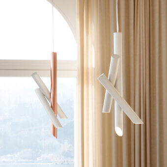 Superior Nemo Tubes suspension lamp with a copper central cylinder and white matte cylindrical extensions crafted in aluminum