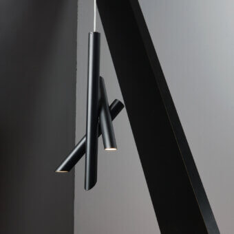 Distinguished Nemo Tubes suspension lamp with aluminum tubular elements and matte black finish crafting a captivating geometric interplay