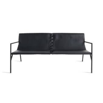 Distinguished Horm Tout Le Jour sofa built in Italy with a matte black metal frame and black synthetic cushions connected by laced detail