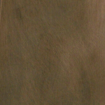Brushed bronze texture with matte finish, warm brown tones, and diagonal linear striations against a dark gray background.