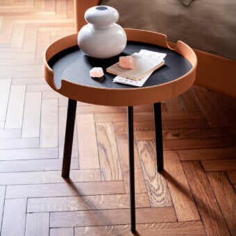 Superior Bolzan Letti Gabri side table crafted with light tan leather upholstery, matte black neolith, and dark metal legs