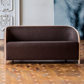 Distinguished Bross Brig sofa with dark brown fabric upholstery and a light-toned wood structure crafted in Italy