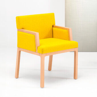 Distinguished Bross Flux armchair crafted in Italy with vibrant yellow fabric upholstery and light-toned wood structure