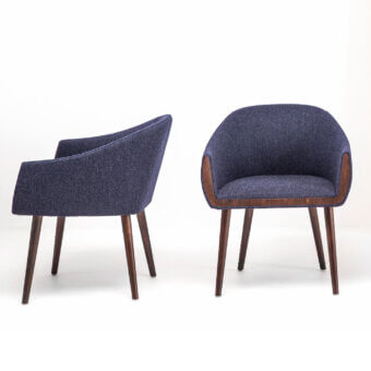 Distinguished Bross Ginevra armchair with dark blue-grey textile upholstery and brown accents built with wooden legs