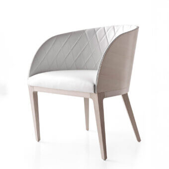 Distinctive Bross Hug armchair with quilted premium fabric and light matte wood complemented by diamond stitching